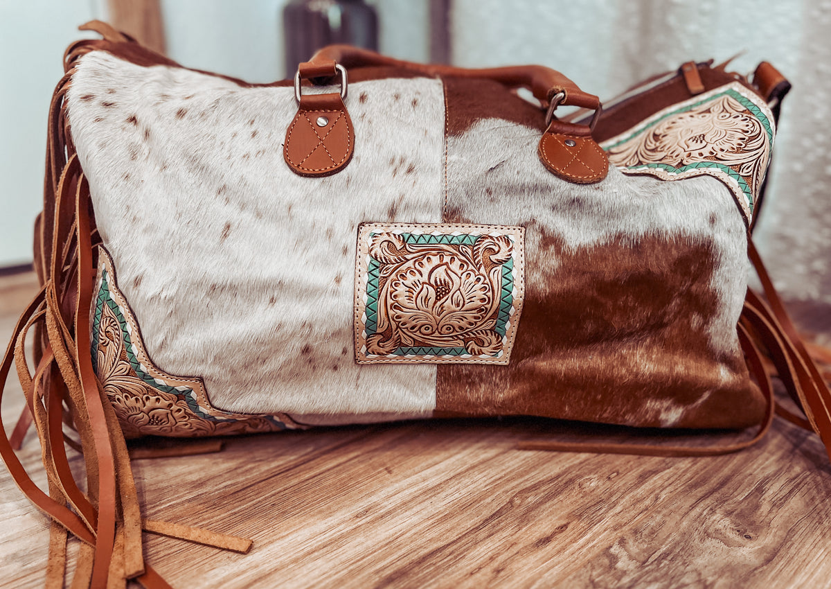 Schneiders® Leather and Cowhide Duffle Bag