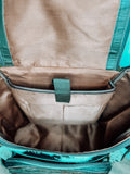 The Emery Cowhide Diaper Bag Backpack