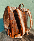 The Delilah Cowhide Diaper Bag Backpack